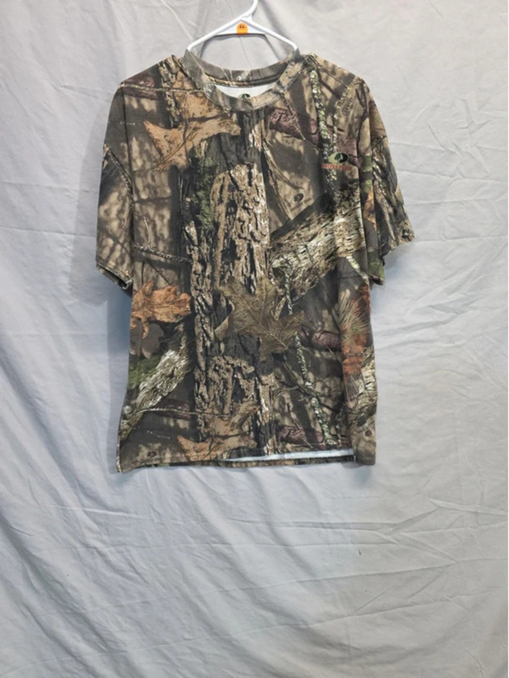 Mossy Oak t-shirt featuring "break-up country" camo patterns